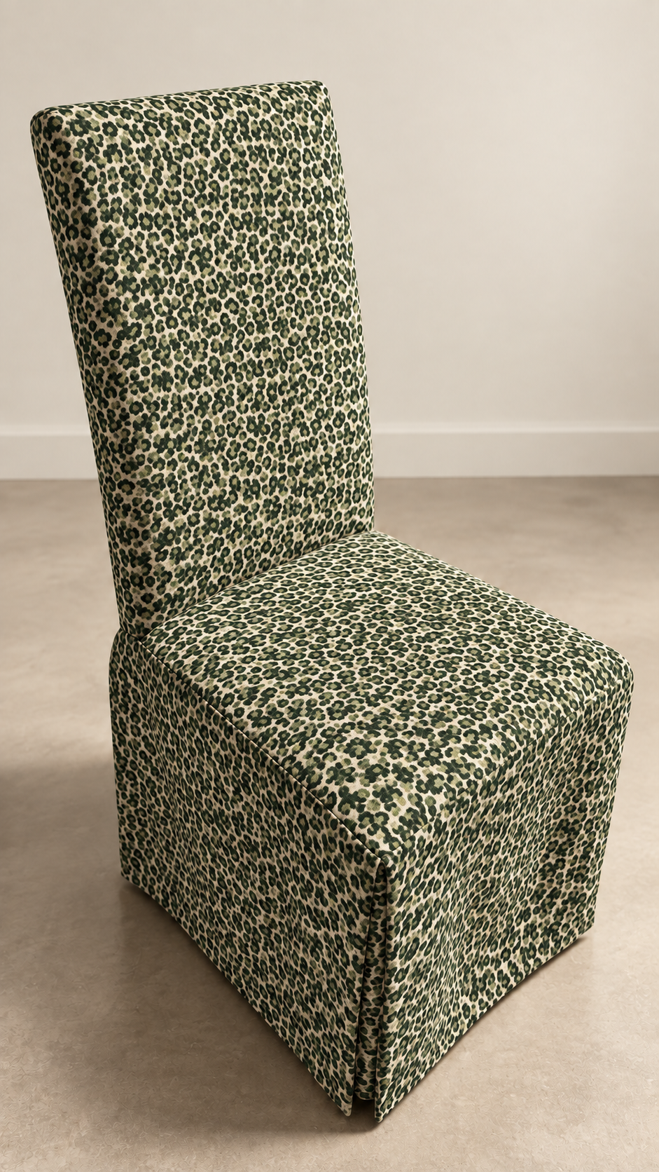 Color preview of a chair in forest green and cream animal-spot upholstery